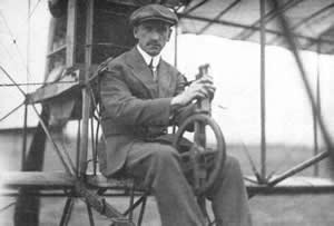 Curtiss sitting on his plane